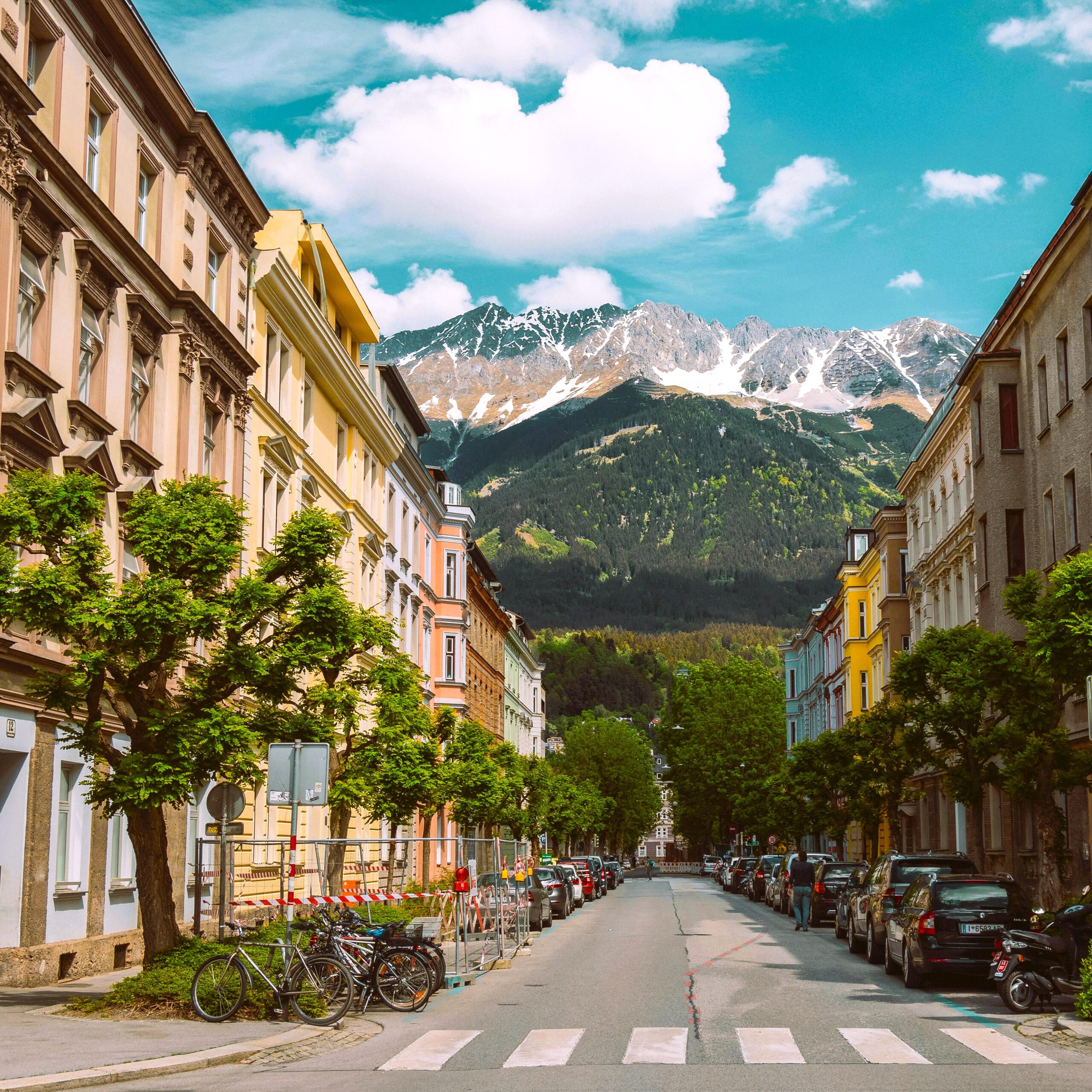 Mountain destination with colorful streets featured in a travel guide
