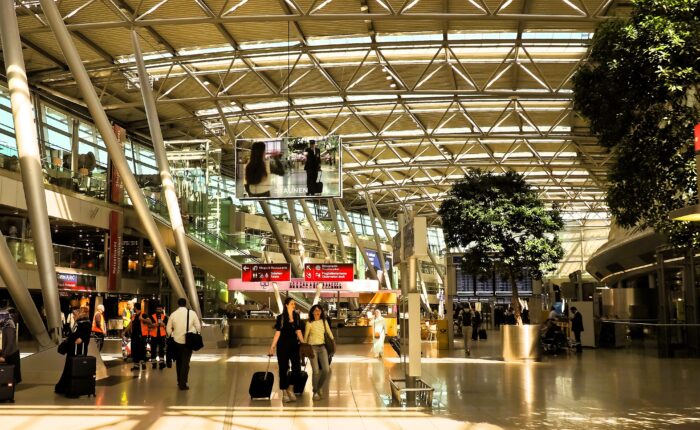 Travelers at a Germany airport following transit visa requirements