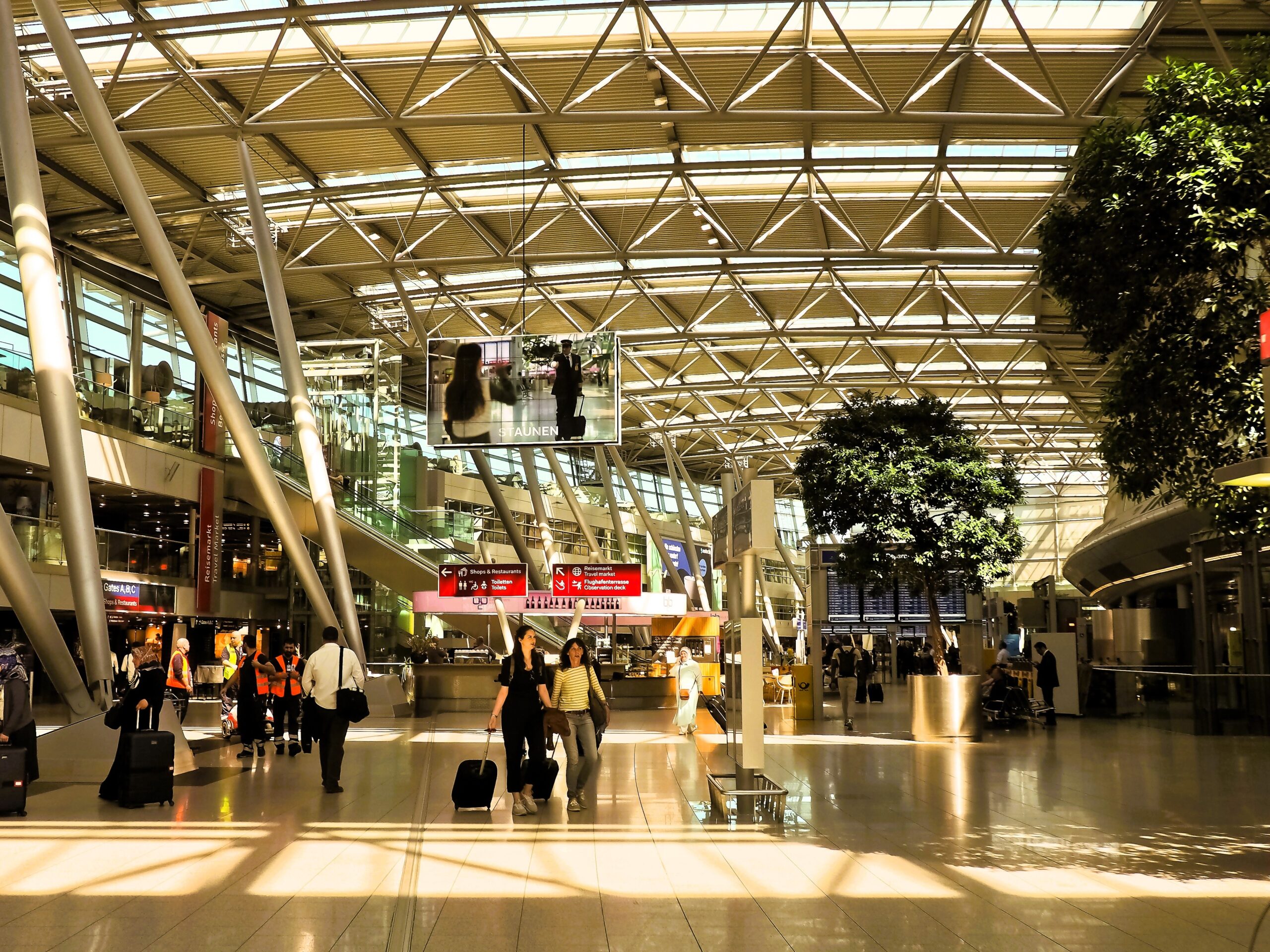 Travelers at a Germany airport following transit visa requirements