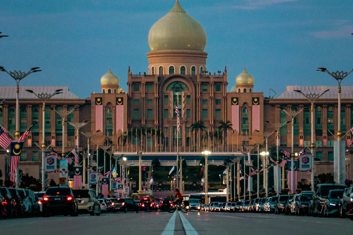Putrajaya government district with landscaped roads and modern buildings featured in Malaysia Tour Package